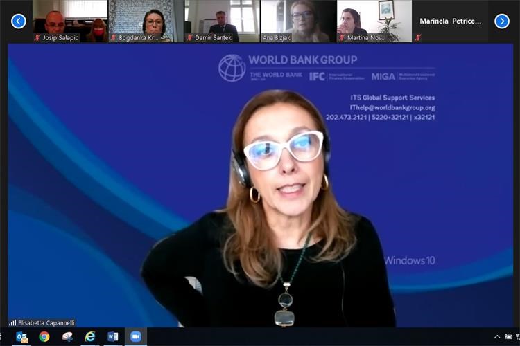 Slika Print screen virtualnog sastanka koji prikazuje voditeljicu ureda Međunarodne banke z aobnovu i razvoj u RH gđu. Elisabettu Capannelli.